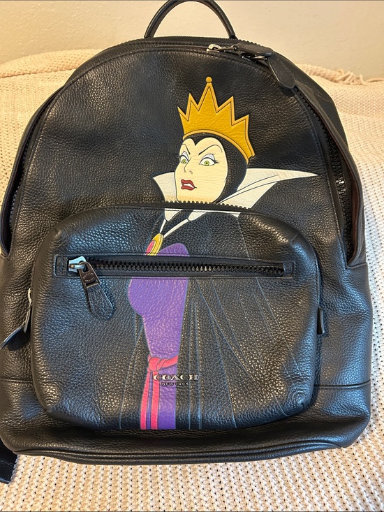 Coach Handbags - Coach Black Leather Backpack with Evil Queen Graphic and Purple Accents
